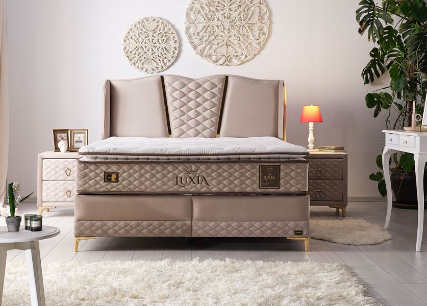 Тапицирано легло «Luxia» + Матрак и табла - с място за съхранение, повдигащ механизъм, система за безшумно затваряне