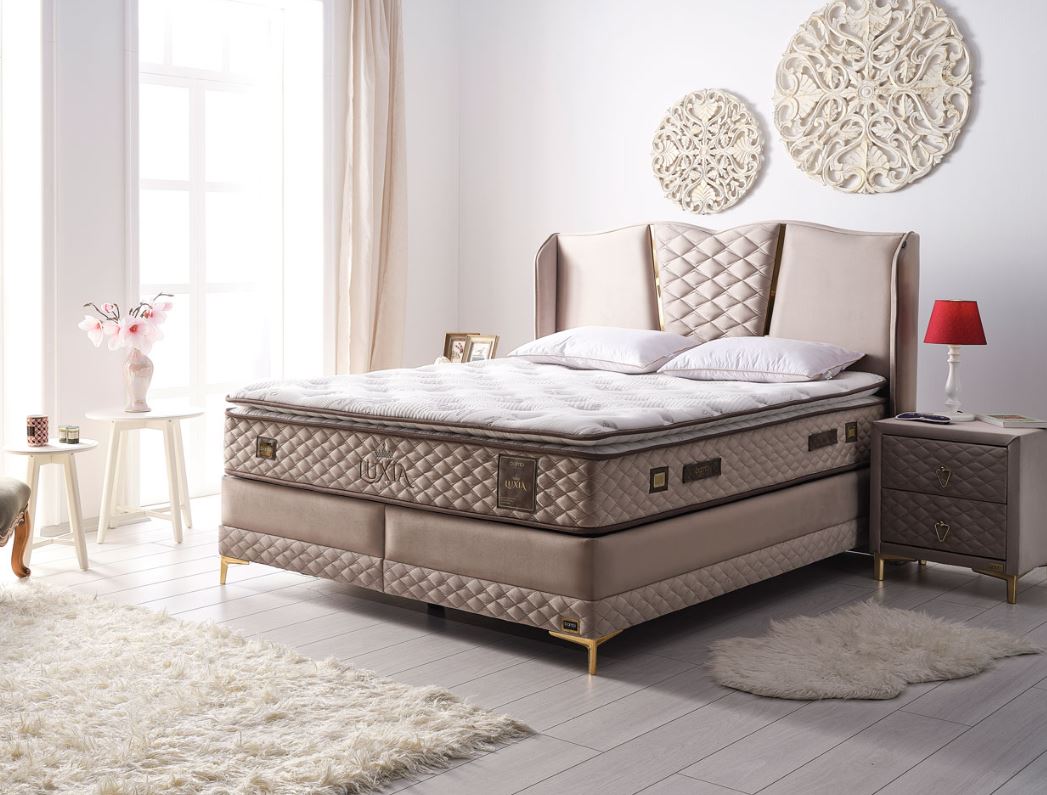 Тапицирана основа за легло «Luxia» с място за съхранение, повдигащ механизъм, система за безшумно затваряне