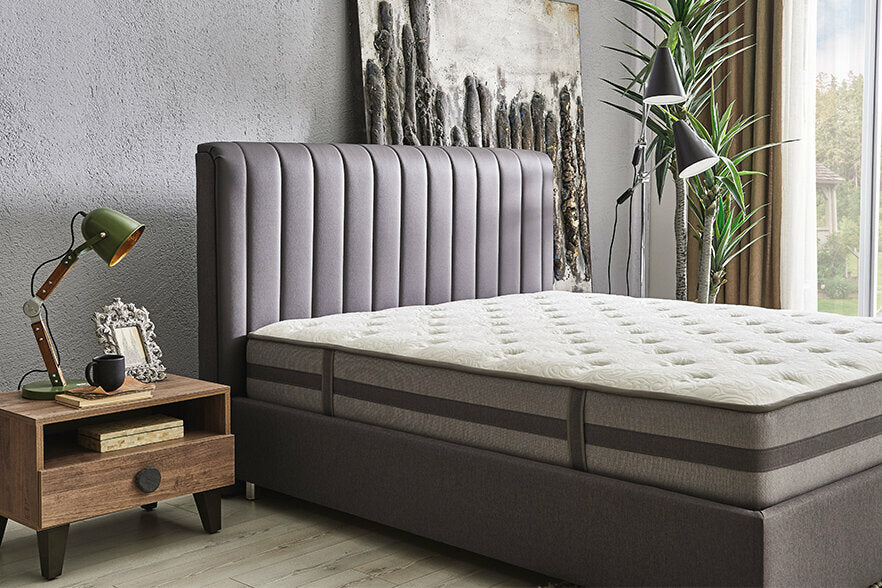 Тапицирана основа за легло «Somni» с място за съхранение, повдигащ механизъм, система за безшумно затваряне