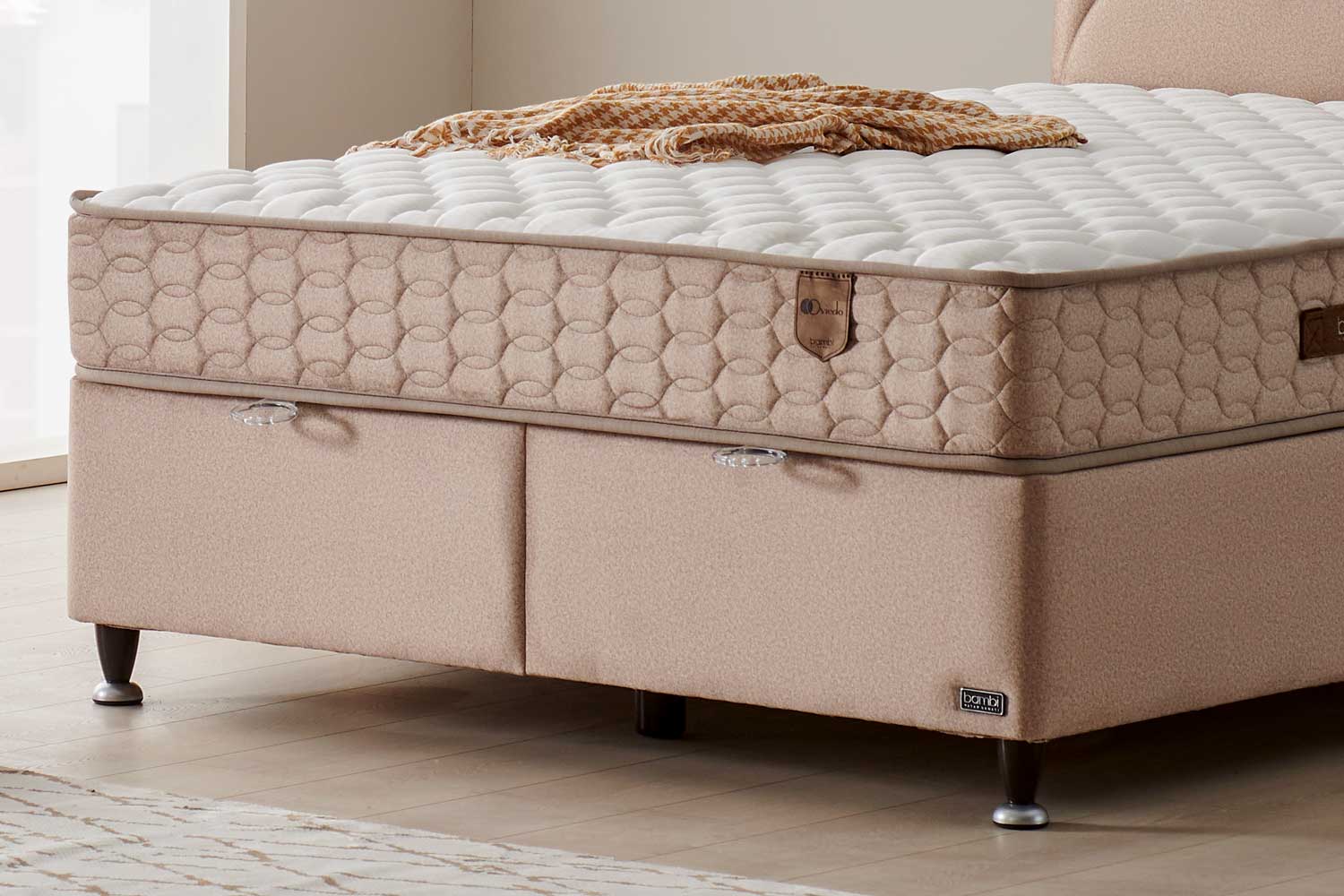 Тапицирана основа за легло «Oviedo» с място за съхранение, повдигащ механизъм, система за безшумно затваряне