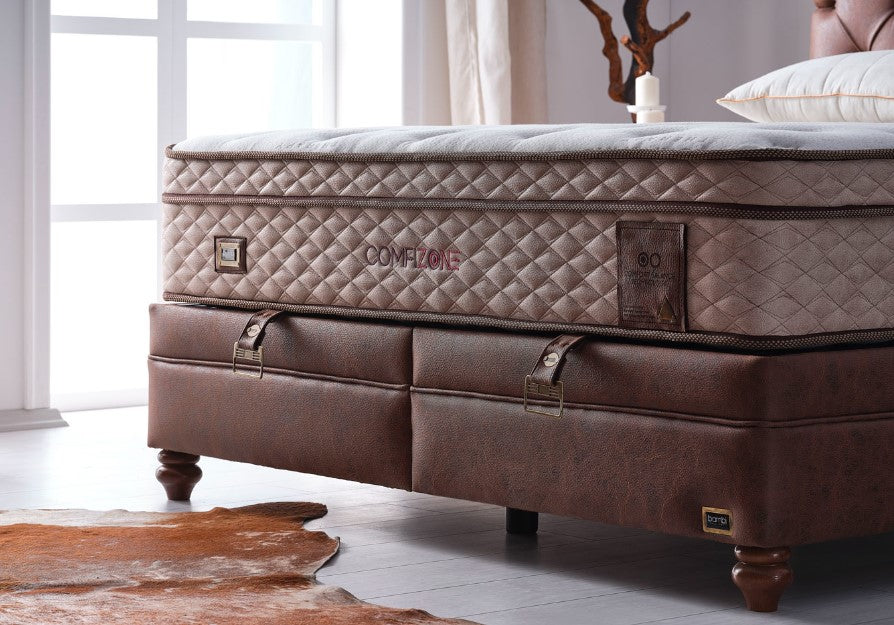 Тапицирана основа за легло «Comfizone» с място за съхранение, повдигащ механизъм, система за безшумно затваряне